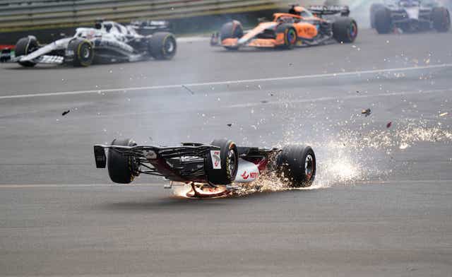 Alfa Romeo’s Zhou Guanyu crashes on the opening lap of the British Grand Prix (Tim Goode/PA).