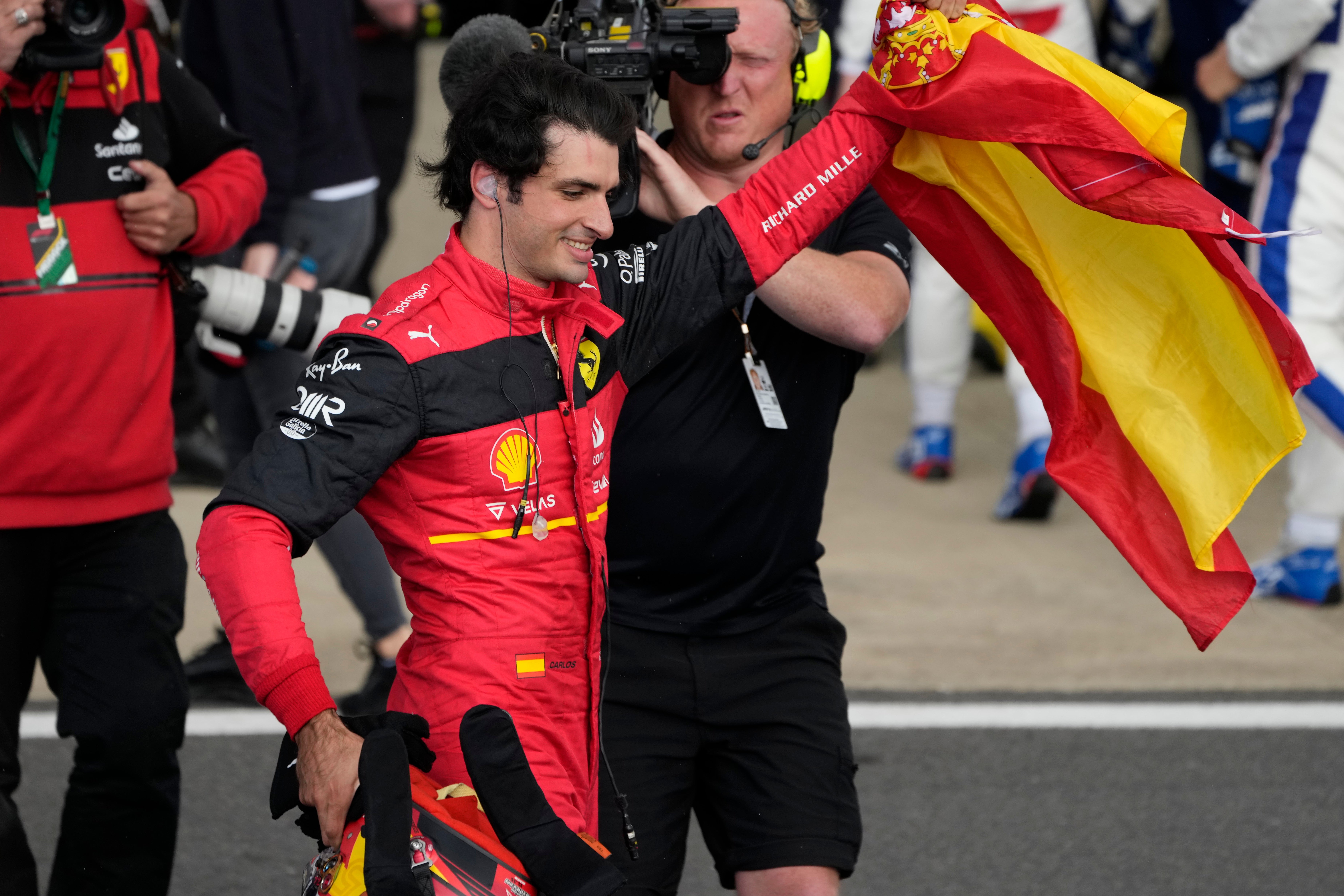 Ferrari driver Carlos Sainz of Spain celebrates
