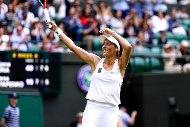 Tatjana Maria celebrates after winning her match against Jelena Ostapenko (PA)