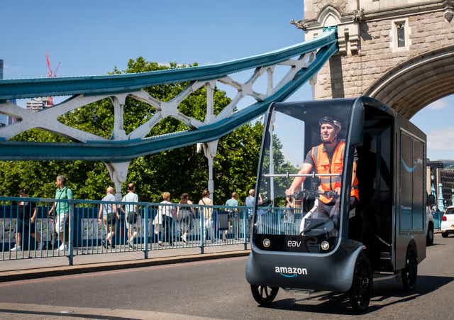 Online retail giant Amazon is start deliveries with electric cargo bikes and walkers to cut its emissions (Amazon/PA)