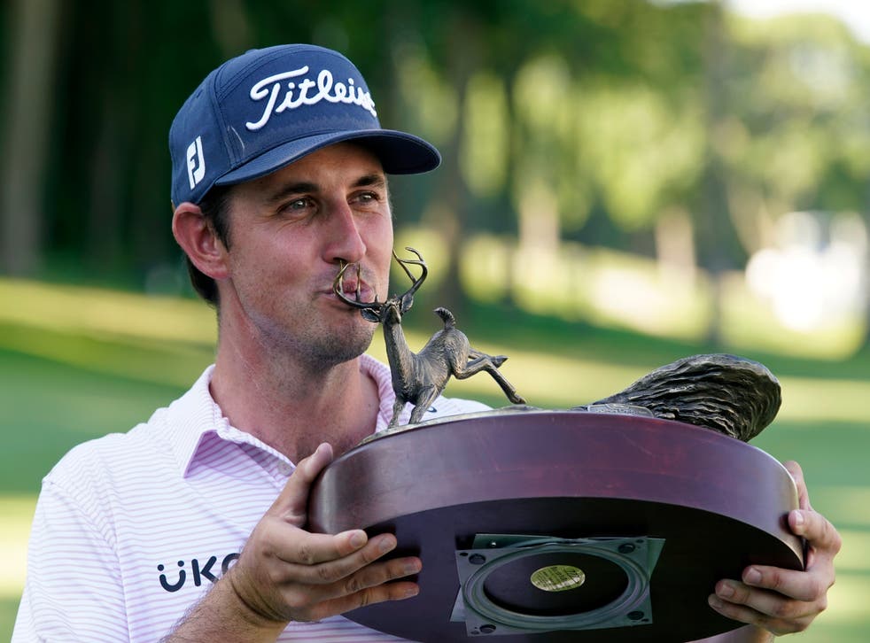 JT Poston held his nerve on Sunday to complete a wire-to-wire victory at the John Deere Classic in Illinois (Charlie Neibergall/AP)