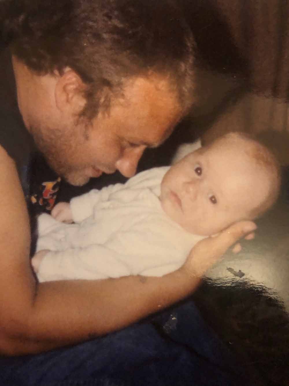Jamie pictured here as a baby with his late father, Kevin. (Collect/PA Real Life)