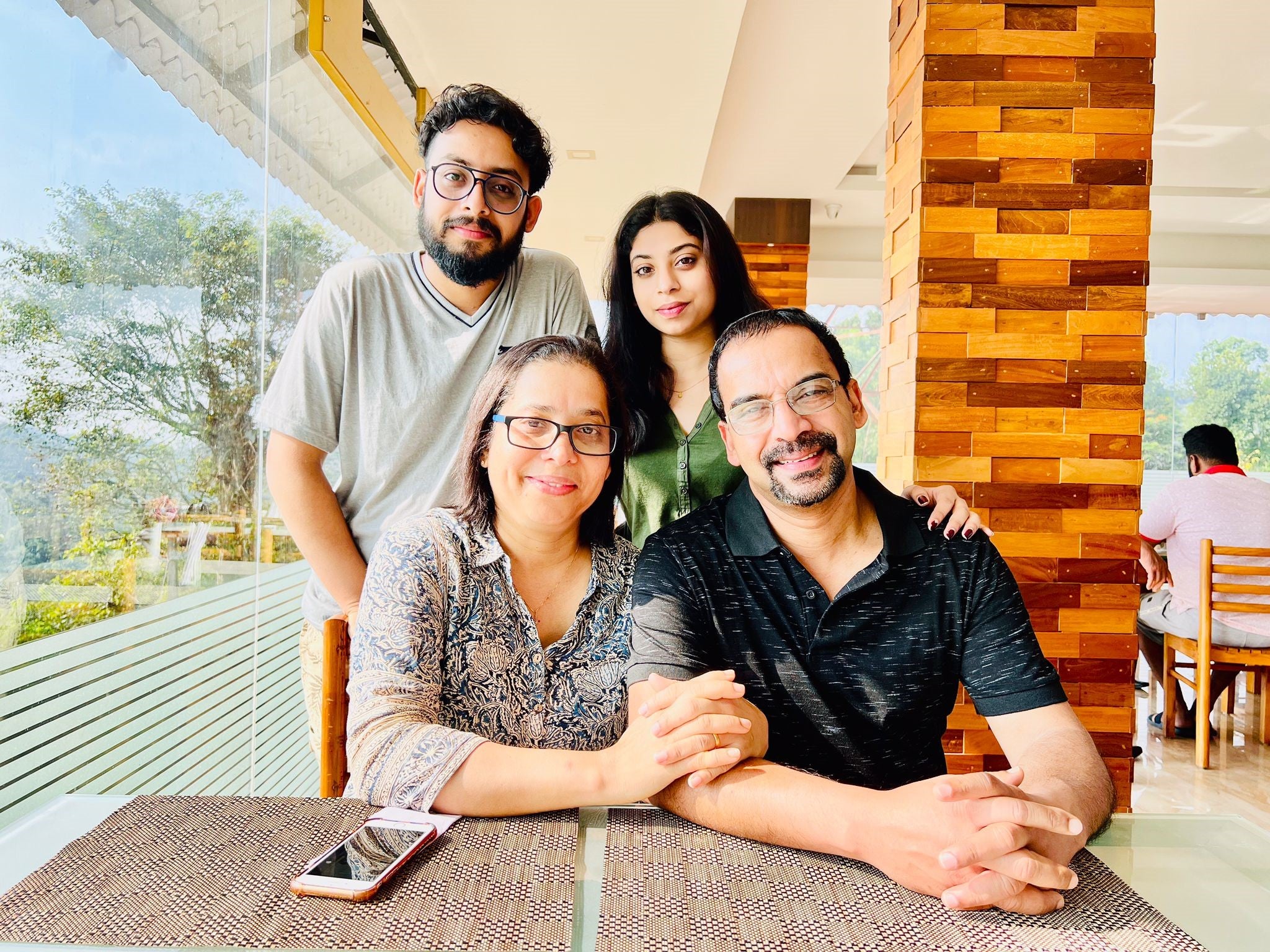 Jasmin David with her husband and two children