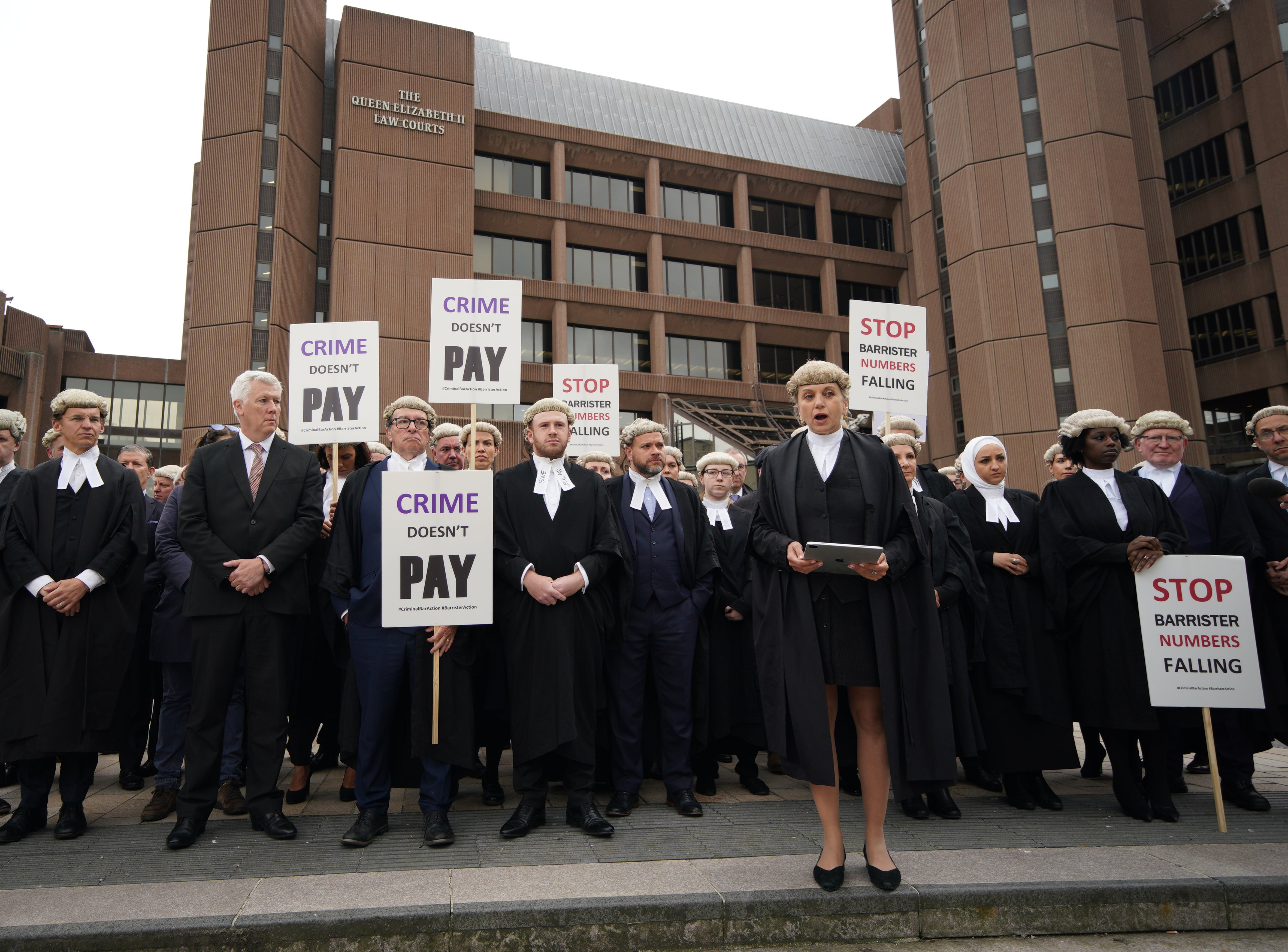 Barristers gathered outside Liverpool Crown Court (Peter Byrne/PA)