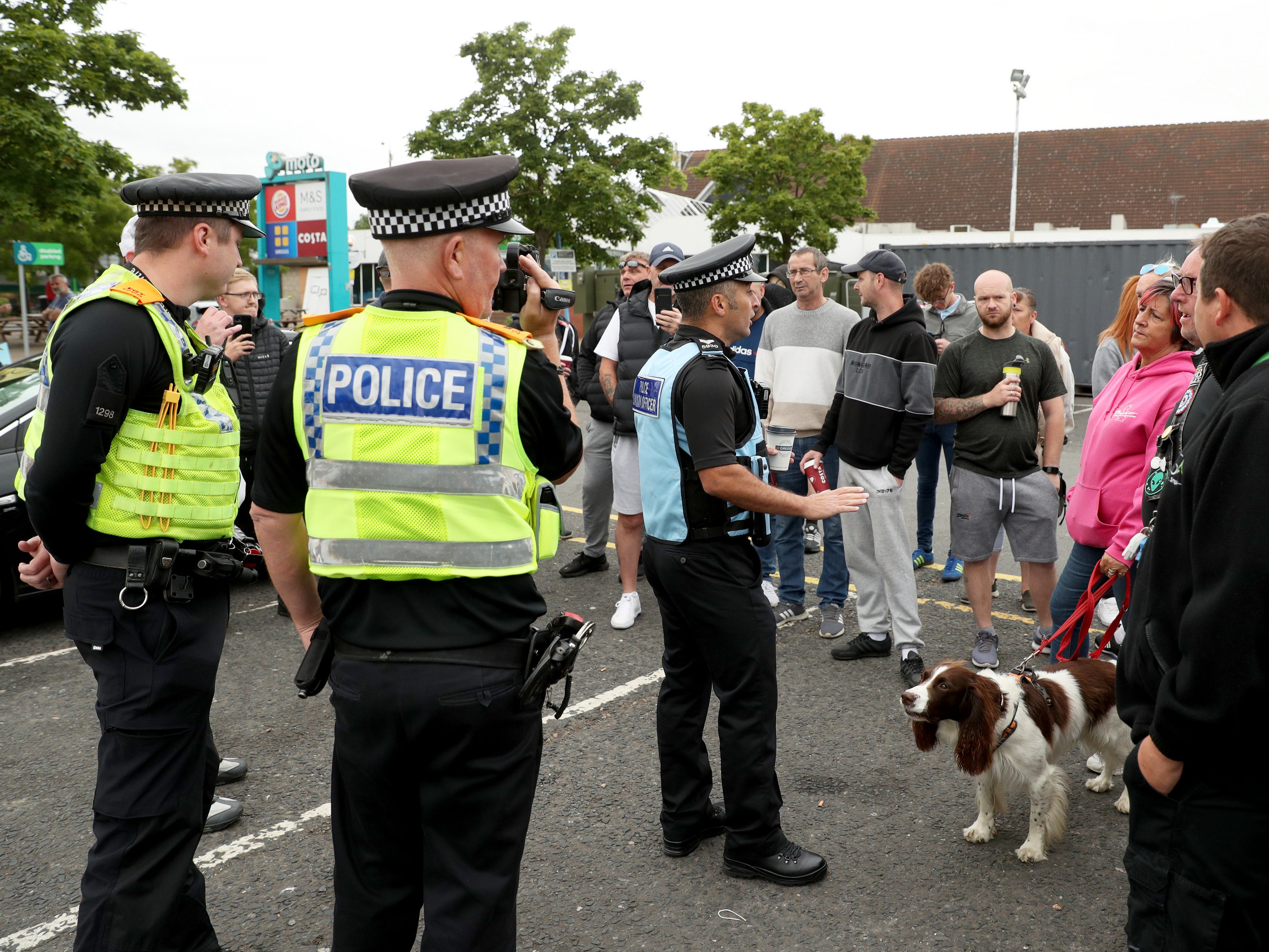 Police liaison officers spoke to protesters in the car park at Ferrybridge service station