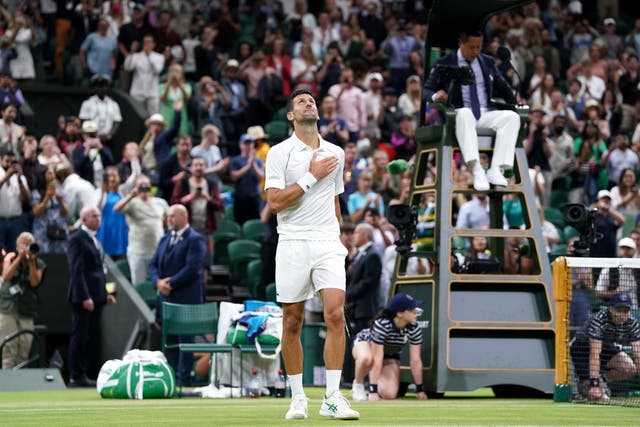 Novak Djokovic celebrates victory after his Gentlemen’s Singles fourth round match against Tim van Rijthoven during day seven of the 2022 Wimbledon Championships at the All England Lawn Tennis and Croquet Club, Wimbledon. (PA)