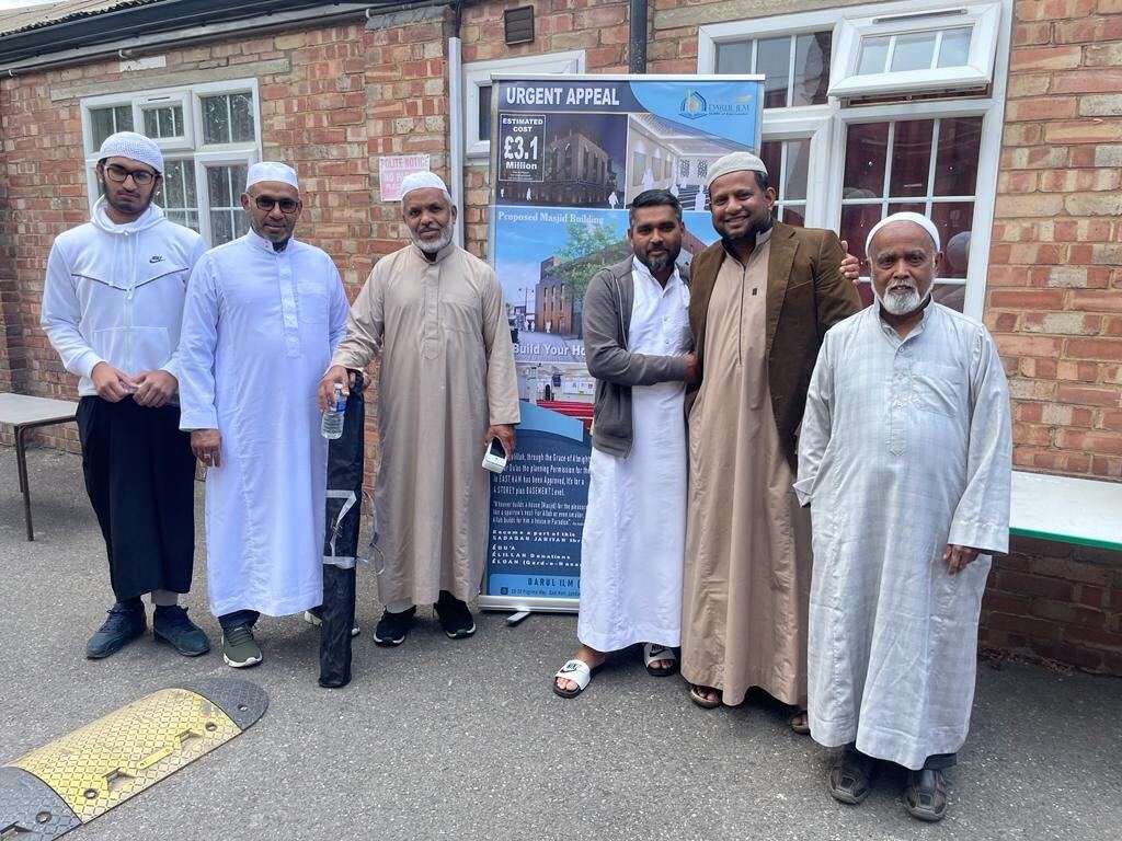 Mr Mohamed (second on the left) says the attack on the Darum Ilm mosque set his community members back both physically and emotionally