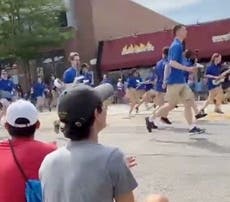 Six victims dead and 24 hospitalised in mass shooting at July 4 parade in Illinois with gunman still at large