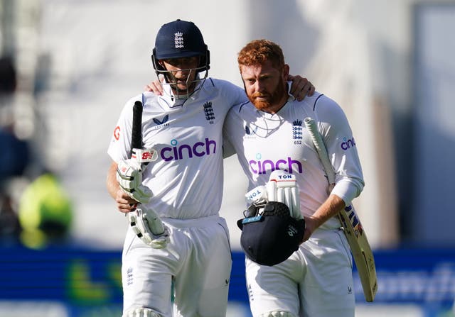 Joe Root and Jonny Bairstow leave the field on day four (David Davies/PA)