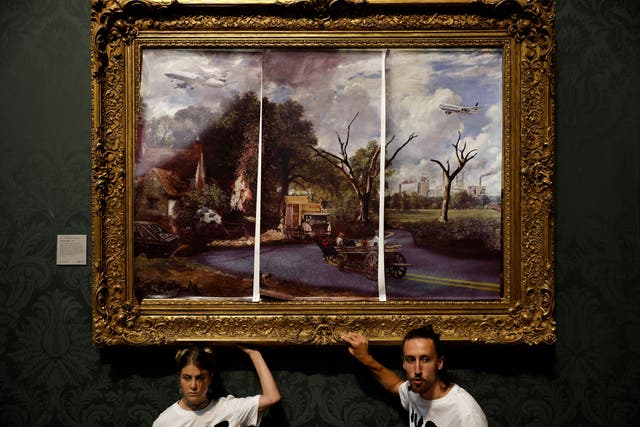 <p>Activists from the ‘Just Stop Oil’ campaign group glued their hands to the frame of ‘The Hay Wain’ by John Constable</p>
