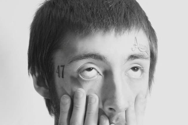 <p>Robert Crimo has a tattoo of the number 47 on the side of his face </p>