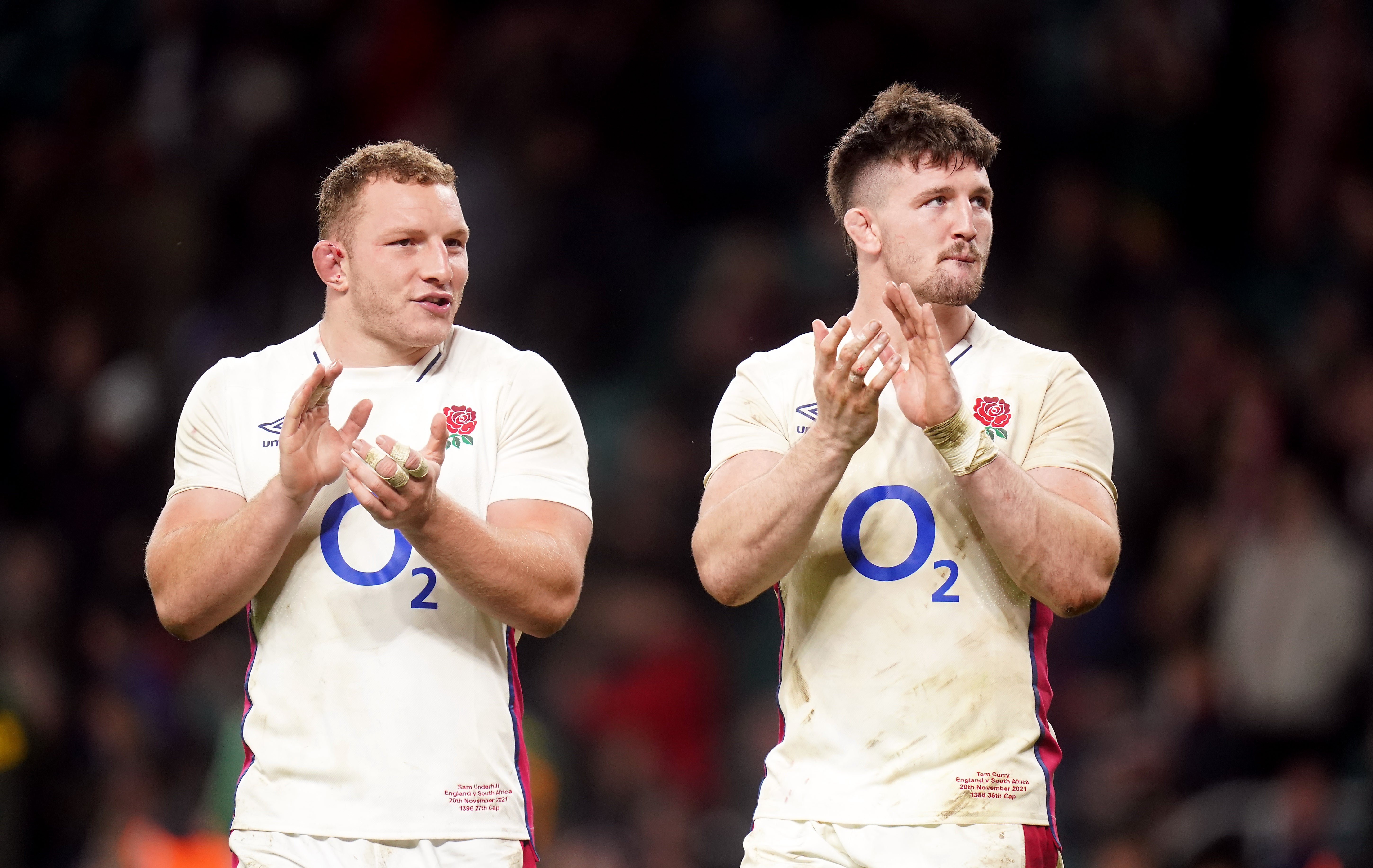 Sam Underhill (left) is a leading contender to replace Tom Curry (right) at openside (Adam Davy/PA)