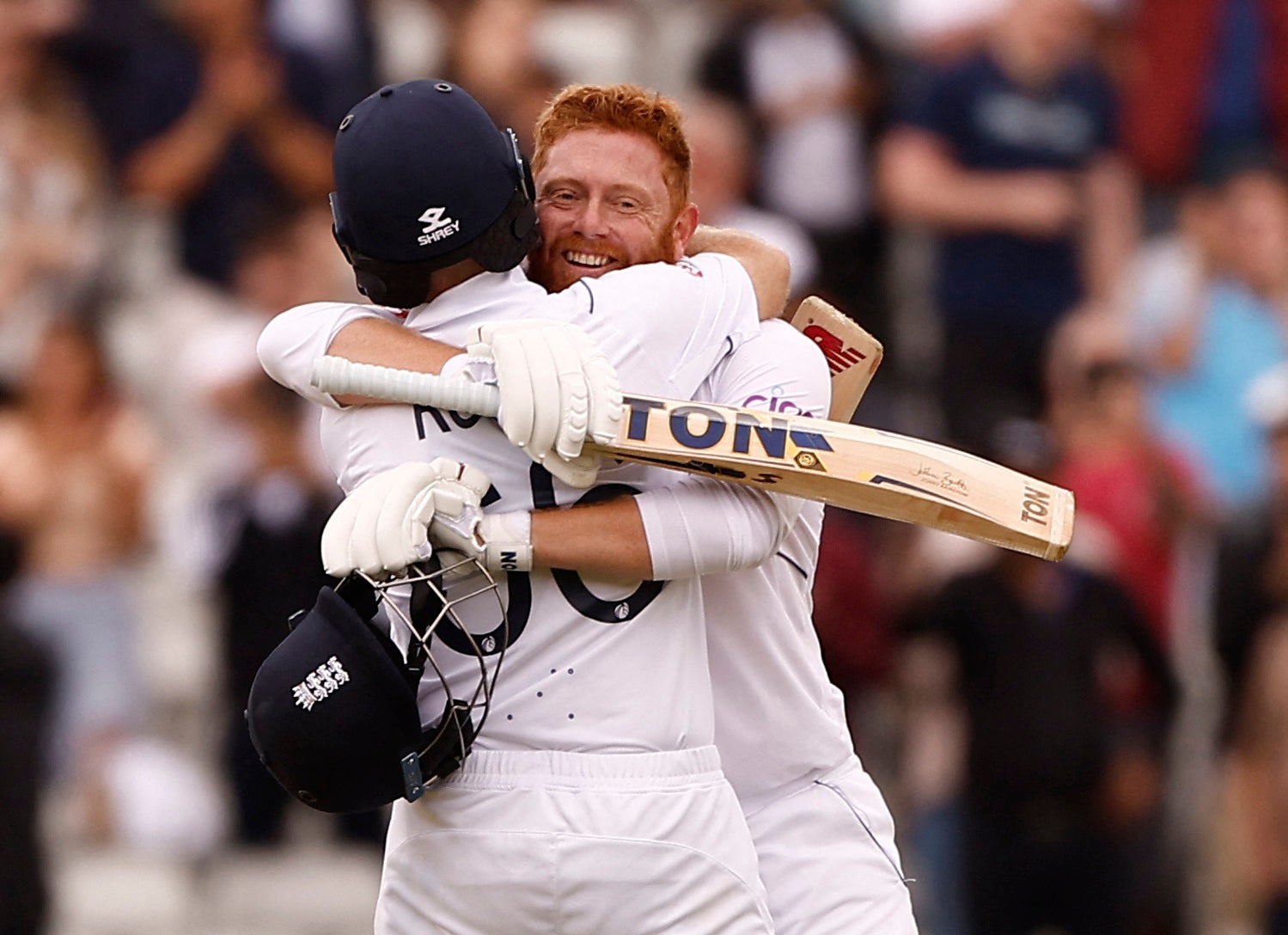 Root and Bairstow embrace after an undefeated stand of 269