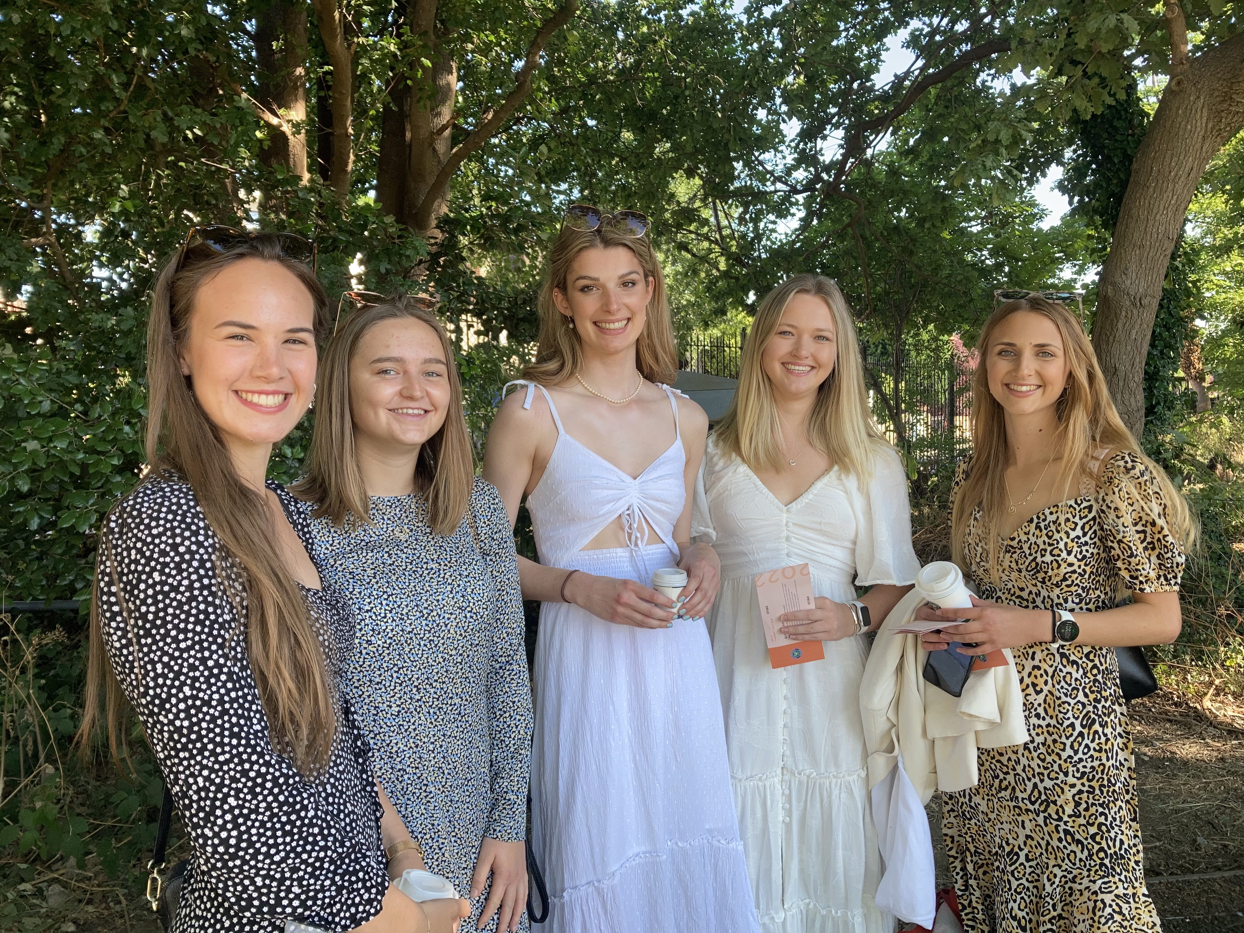 (left to right) Esme Bliss, 22, Hannah Sharpe, 22, Charlotte Petter, 21, Charlotte Kilpatrick, 21 and Hannah Ord, 21 attend on day nine of the 2022 Wimbledon Championships (Rebecca Speare-Cole/PA)