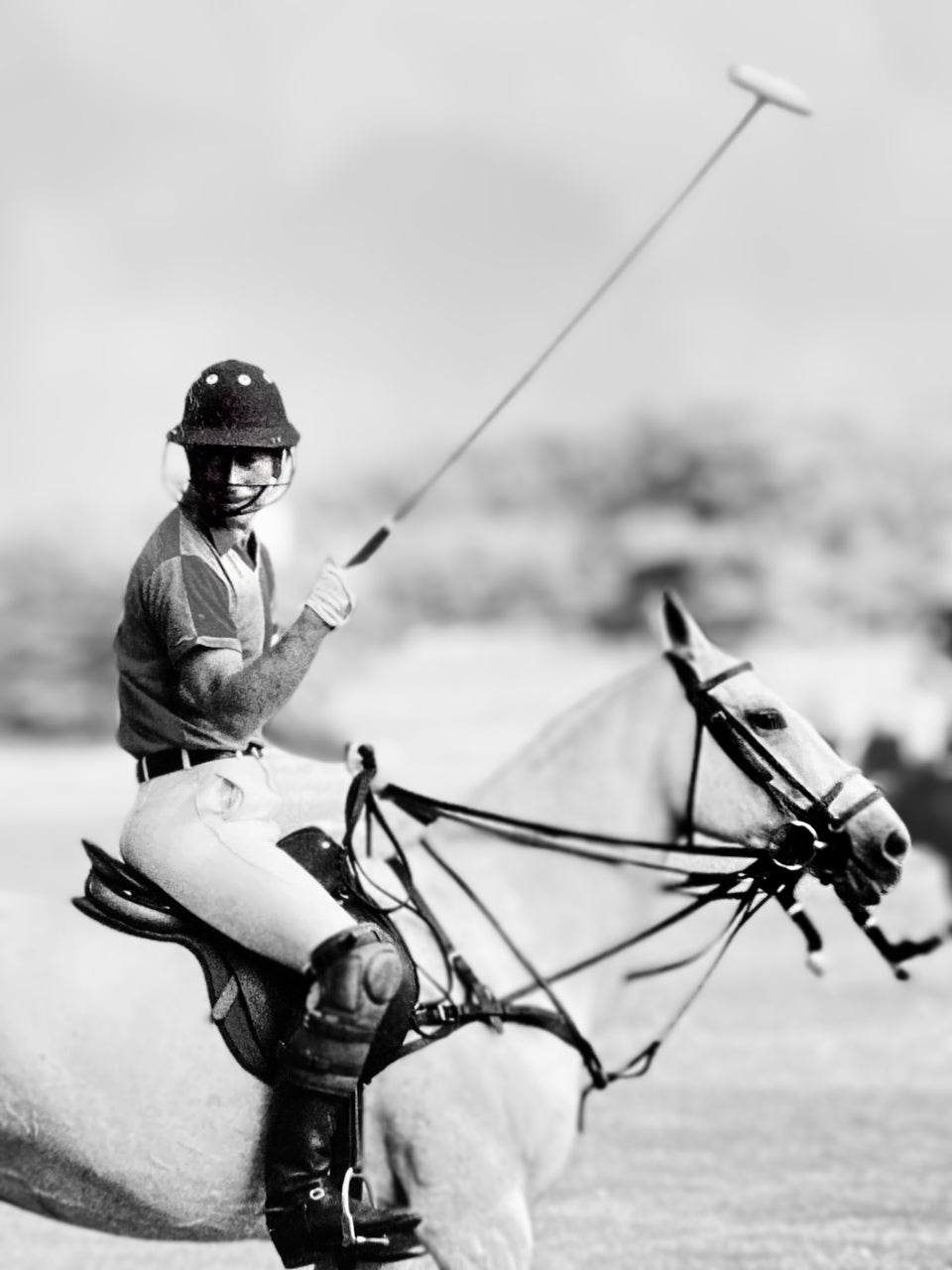 The Prince of Wales playing polo photographed by Gilbert from London in the 1980s (Historic Royal Palaces/PA)