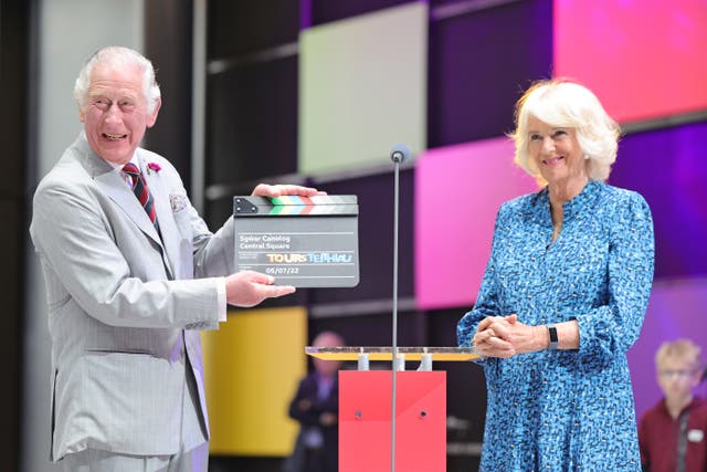 The Prince of Wales and the Duchess of Cornwall in the Atrium during a visit to BBC Wales’s new headquarters (Chris Jackson/PA)