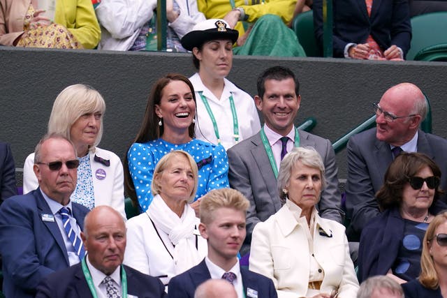 The Duchess of Cambridge alongside Tim Henman in the stands on court one watch the Gentlemen’s Singles quarter-final match between Cameron Norrie and David Goffin. (PA)