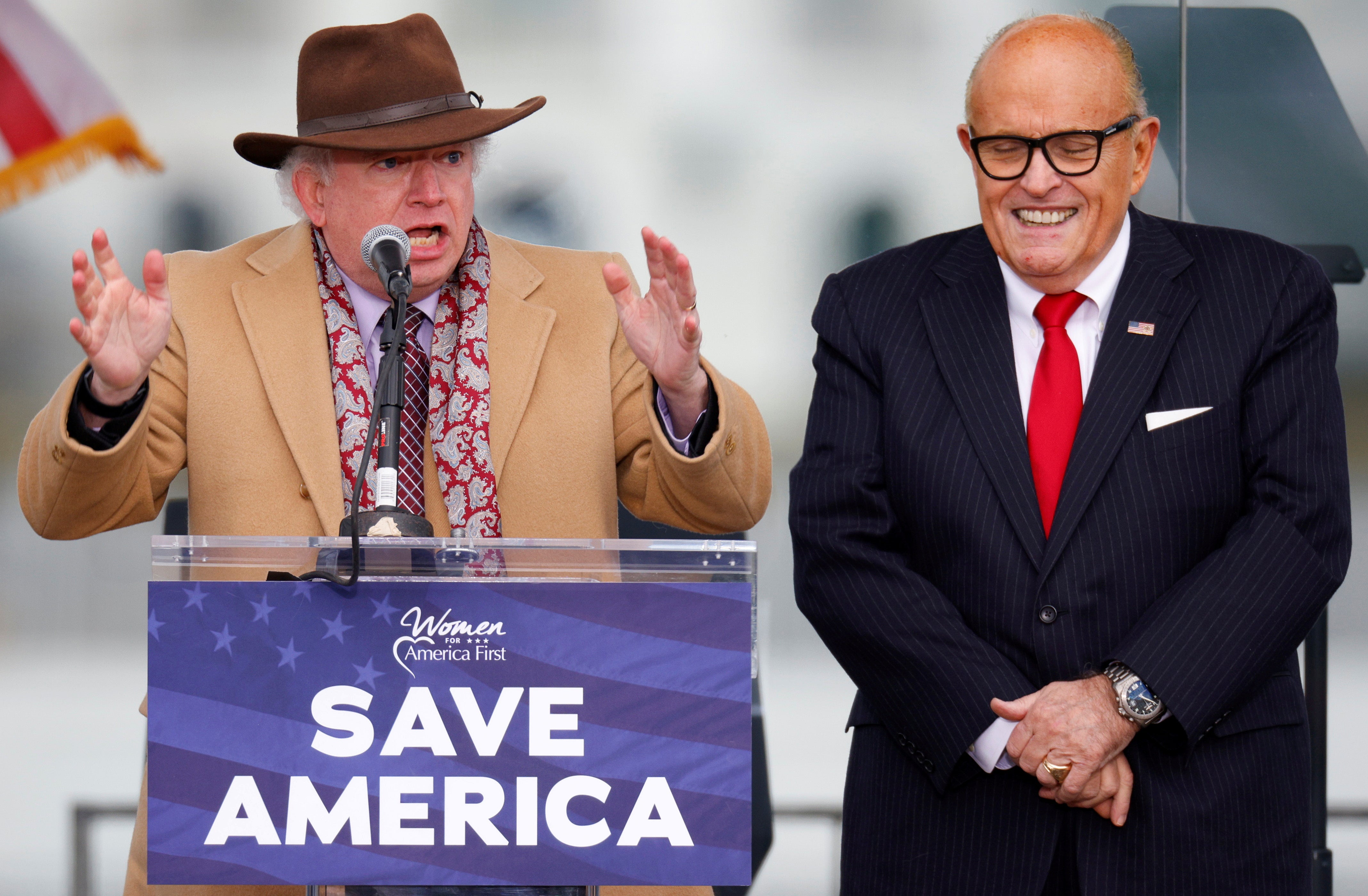 <p>Attorney John Eastman speaks next to President Donald Trump’s personal attorney Rudy Giuliani at the 6 January 2021 rally in Washington, DC</p>