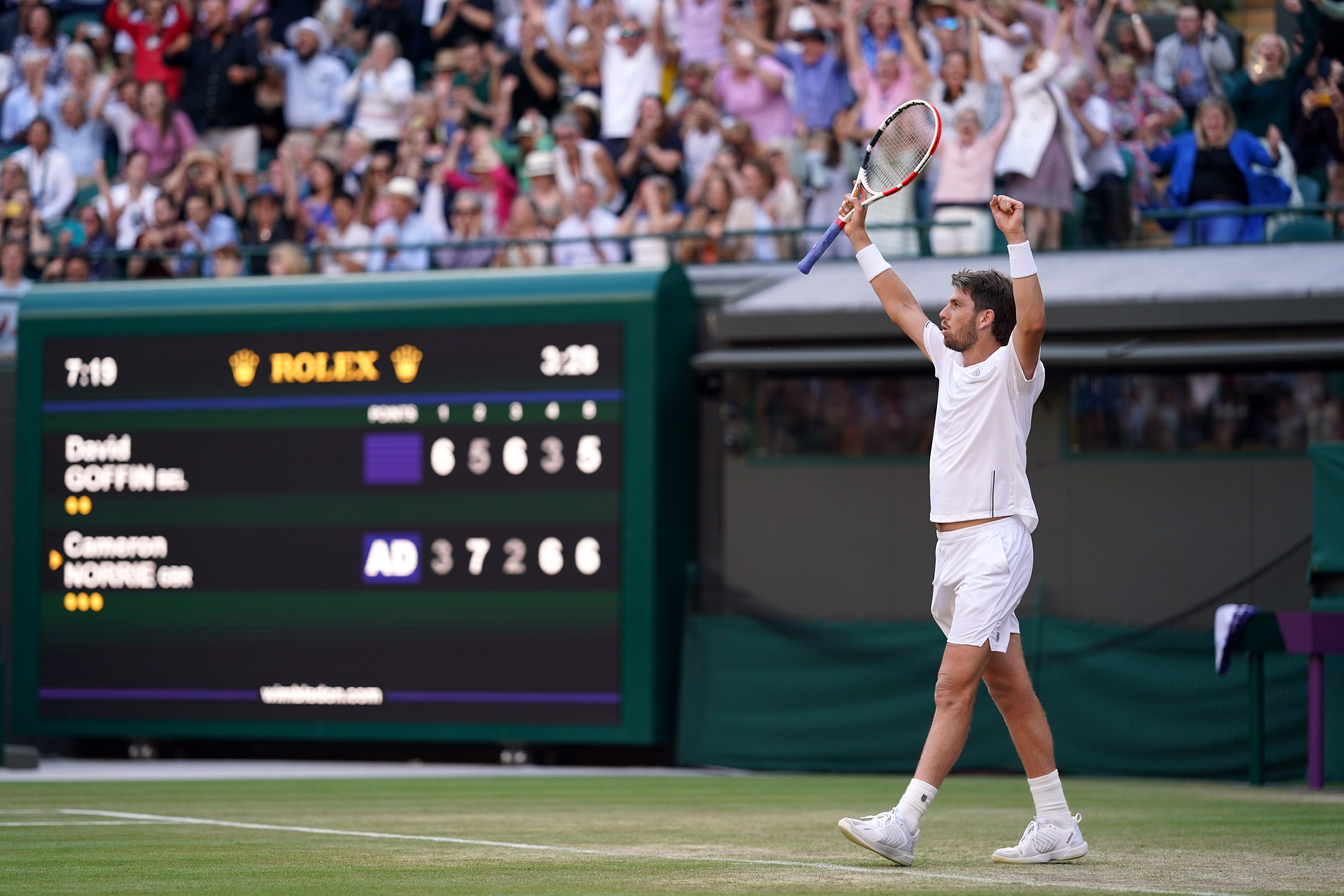 Cameron Norrie celebrates winning his Wimbledon quarter-final with David Goffin (John Walton/PA)