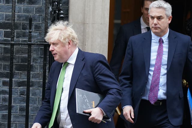 <p>Prime Minister Boris Johnson and Steve Barclay leave Downing Street (Stefan Rousseau/PA)</p>