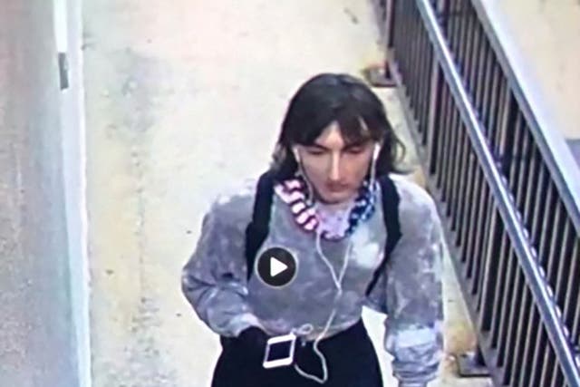 <p>Surveillance image of what police believe to be is Robert E Crimo III dressed in women’s clothing to escape after shooting </p>