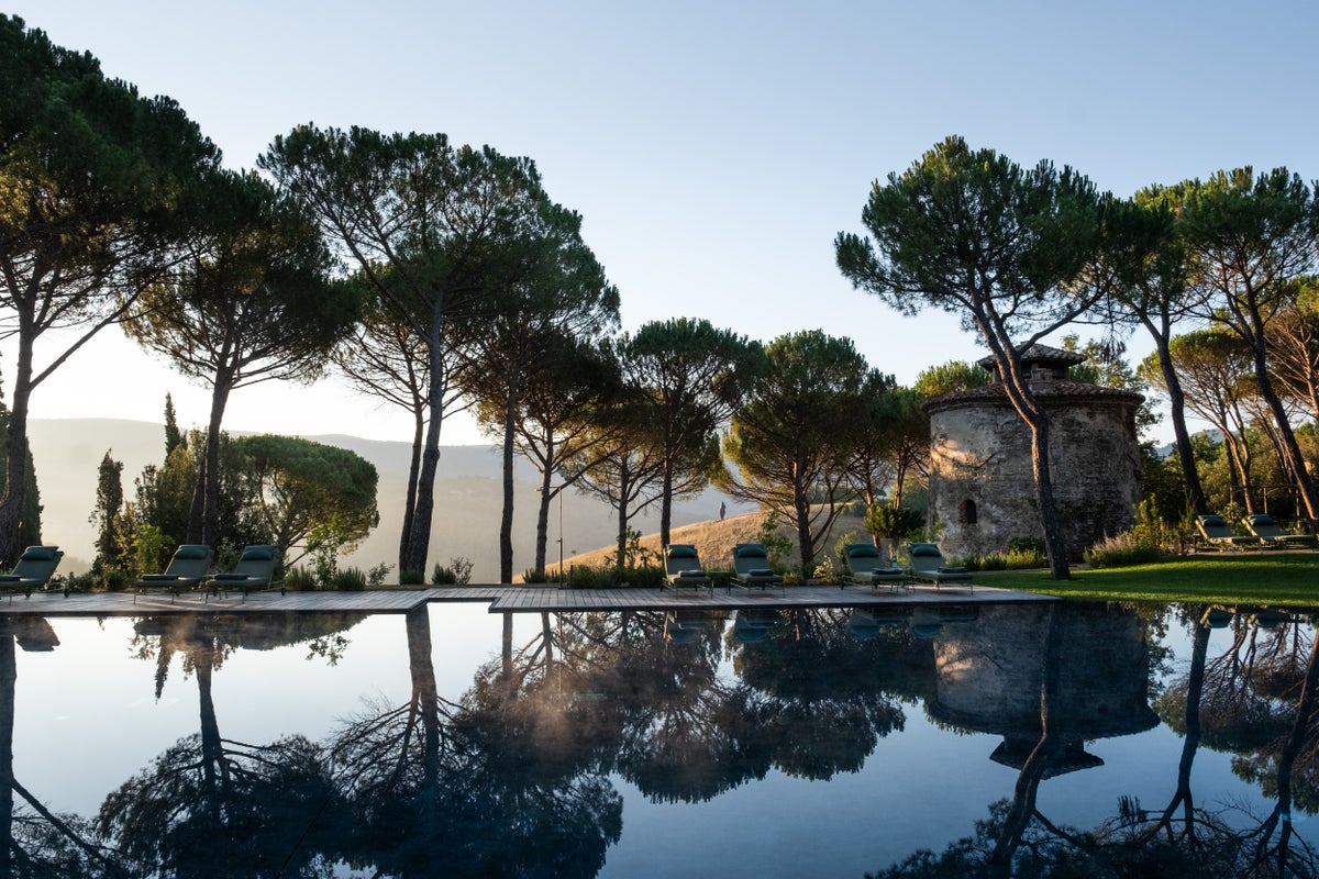 From Lake Garda to the Savannah, these are the world’s best hotels with swimming pools