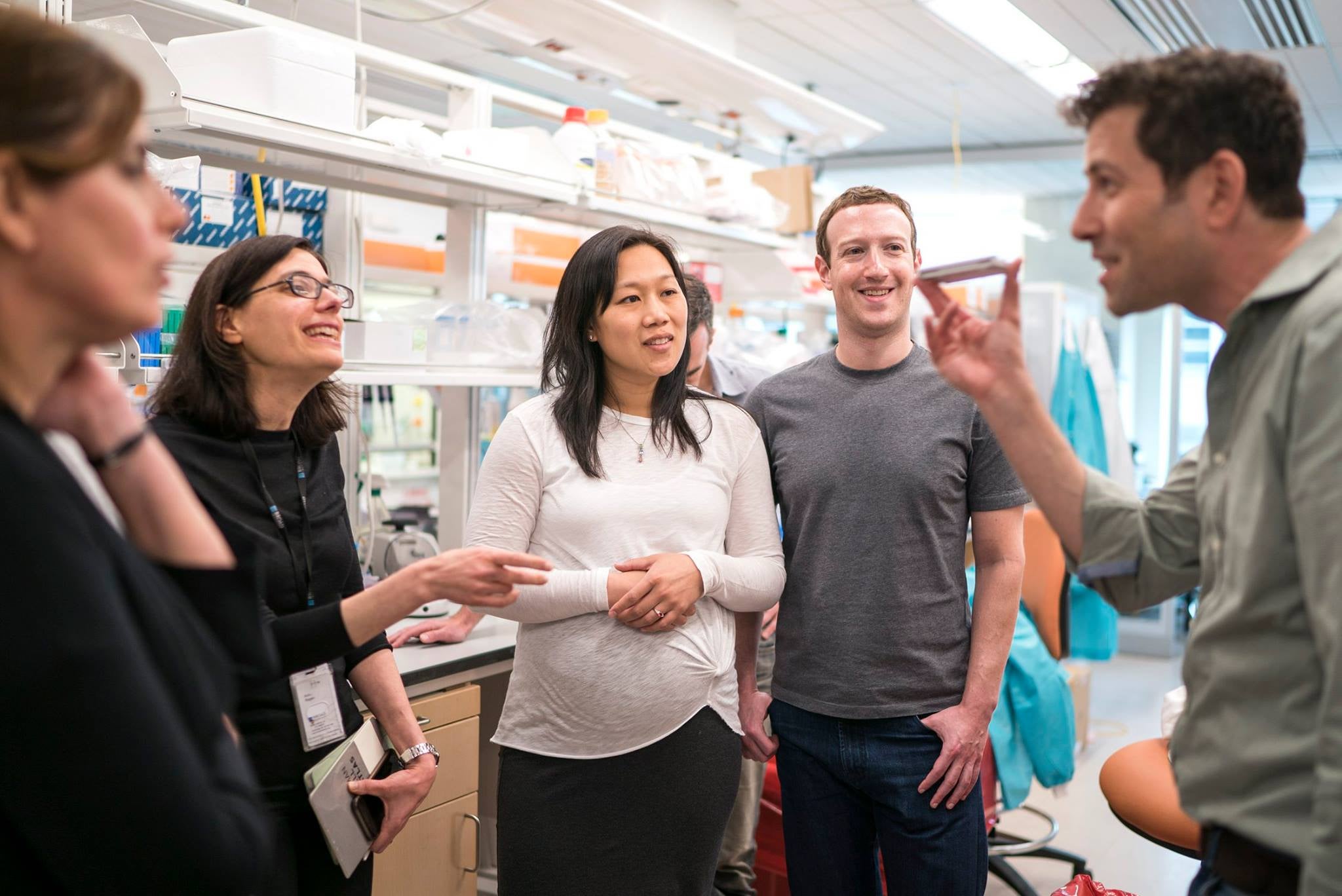 Priscilla Chan and Mark Zuckerberg with Moshe Biton (right) and Aviv Regev (left). The Chan Zuckerberg Initiative is one of the major funders of the Human Cell Atlas