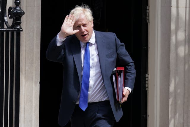 Prime Minister Boris Johnson leaves 10 Downing Street for Prime Minister’s Questions (Stefan Rousseau/PA)