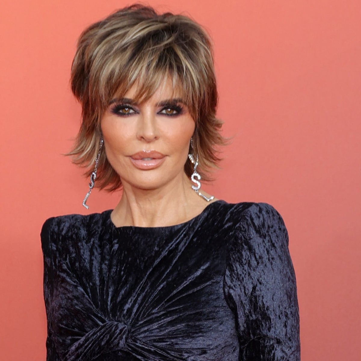 Lisa Rinna says recent 'rage' is from grief after mother's death, critics