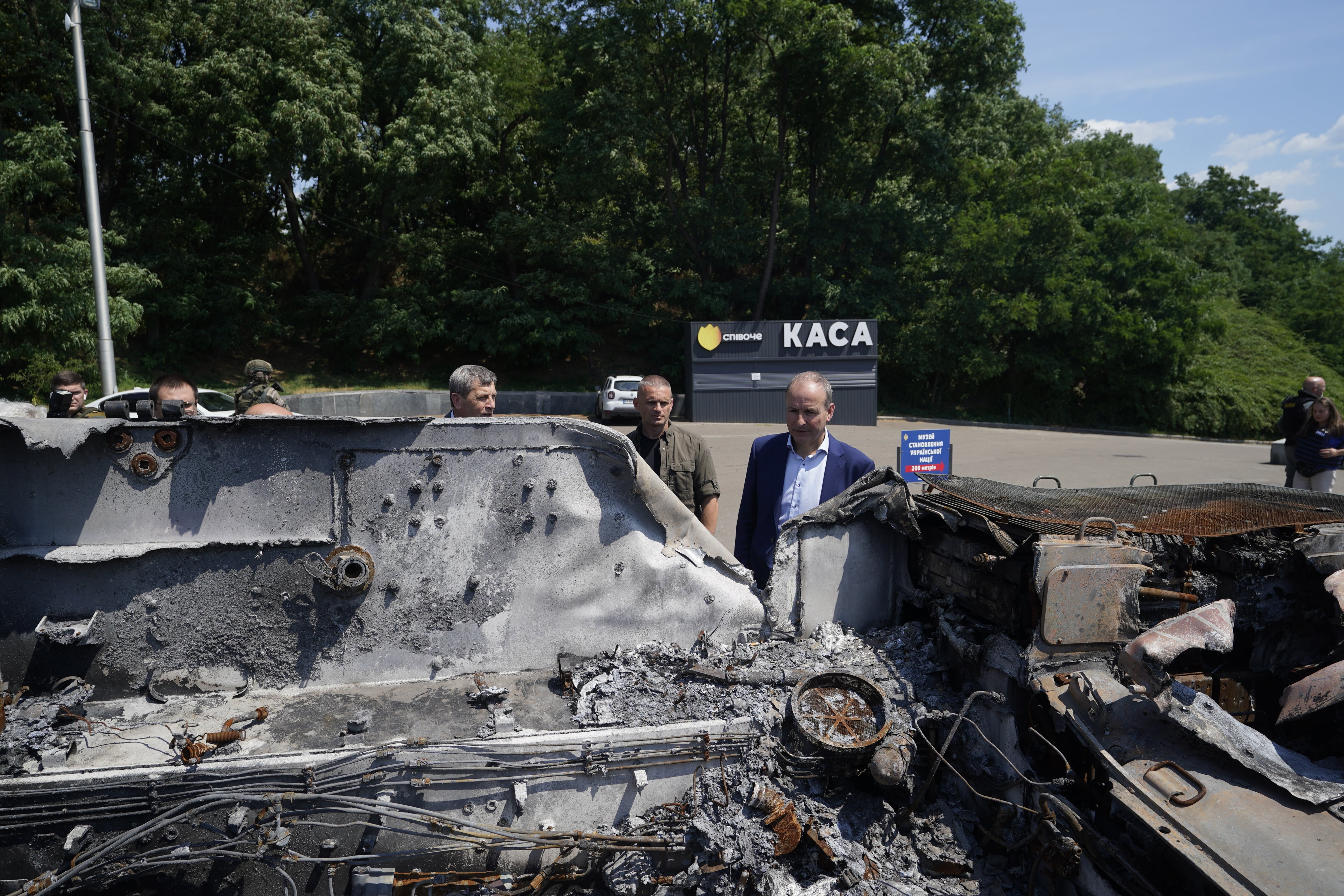 Taoiseach Micheal Martin views bomb-damaged Russian military vehicles at the National Museum of the History of Ukraine (Niall Carson/PA)