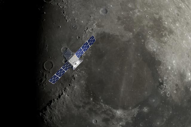 <p>An artist’s conception of Nasa’s Capstone spacecraft in orbit around the Moon</p>