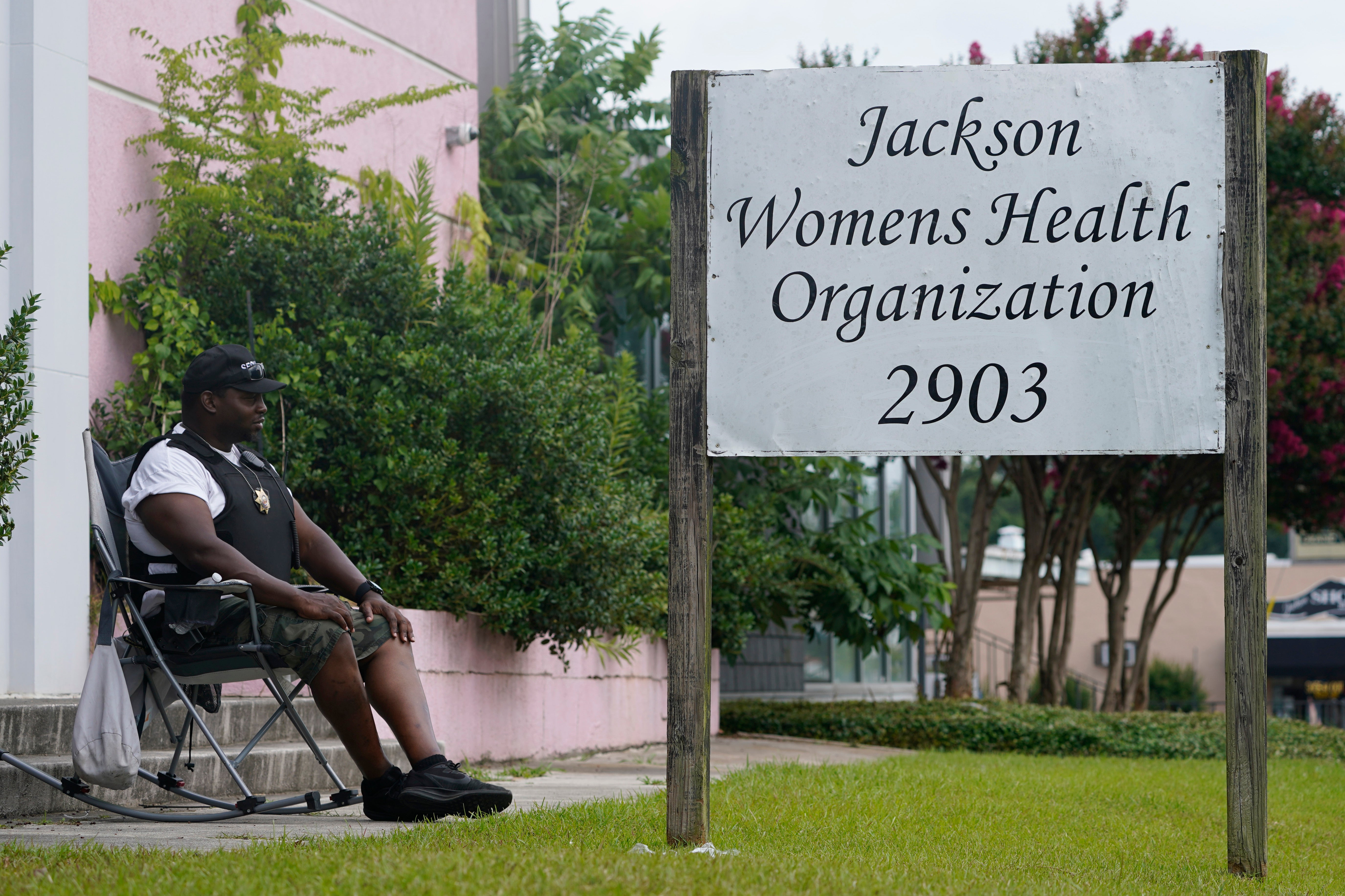 A security guard sits outside the Jackson Women’s Health Organization clinic in Mississippi on 30 June