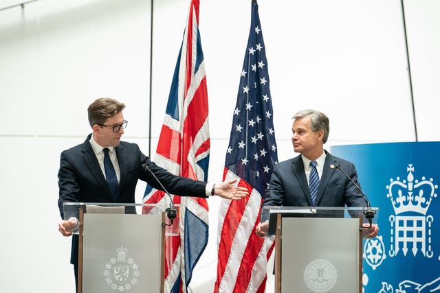 <p>MI5 director general Ken McCallum (left) and FBI director Christopher Wray at a joint press conference at MI5 in London on Wednesday</p>