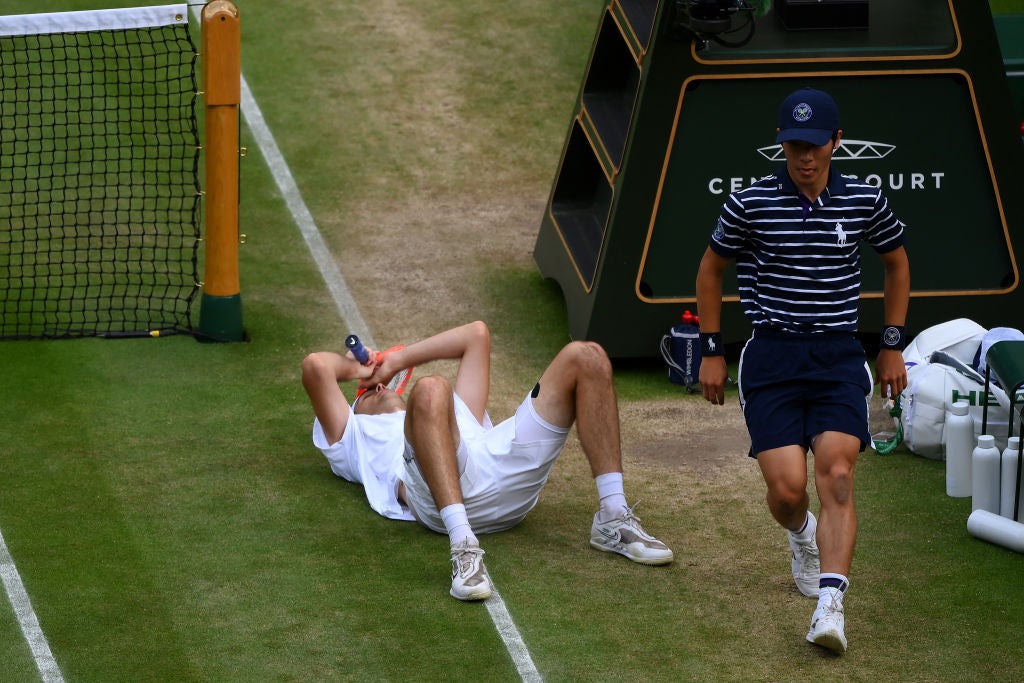 Fritz is left on the Centre Court floor near the end of his epic contest with Nadal