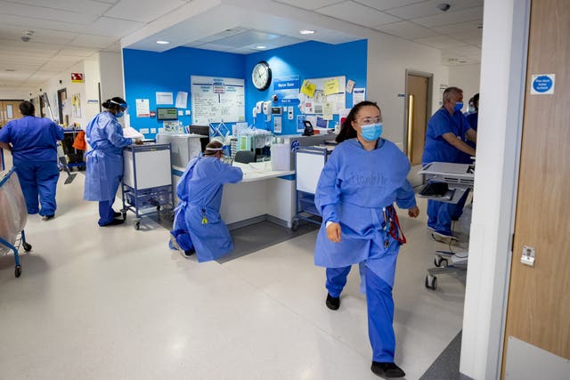 Covid-related absences had been fully paid for all NHS workers, regardless of their length of service (Peter Byrne/ PA)