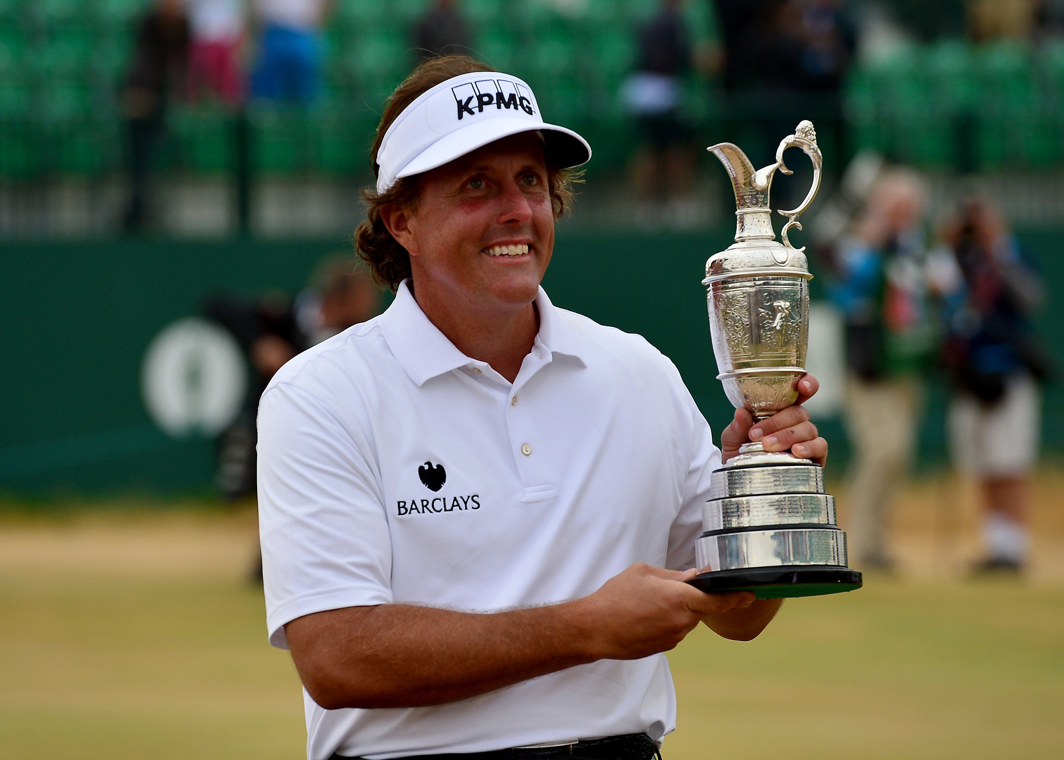 Phil Mickelson celebrated with the Claret Jug after winning the 2013 Open Championship (Owen Humphreys/PA)