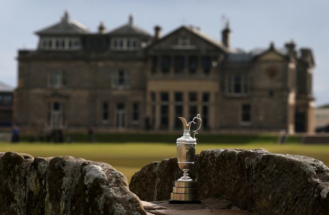 The Claret Jug sits by the Swilcan Bridge in front of the R&A clubhouse at St Andrews (PA Archive)
