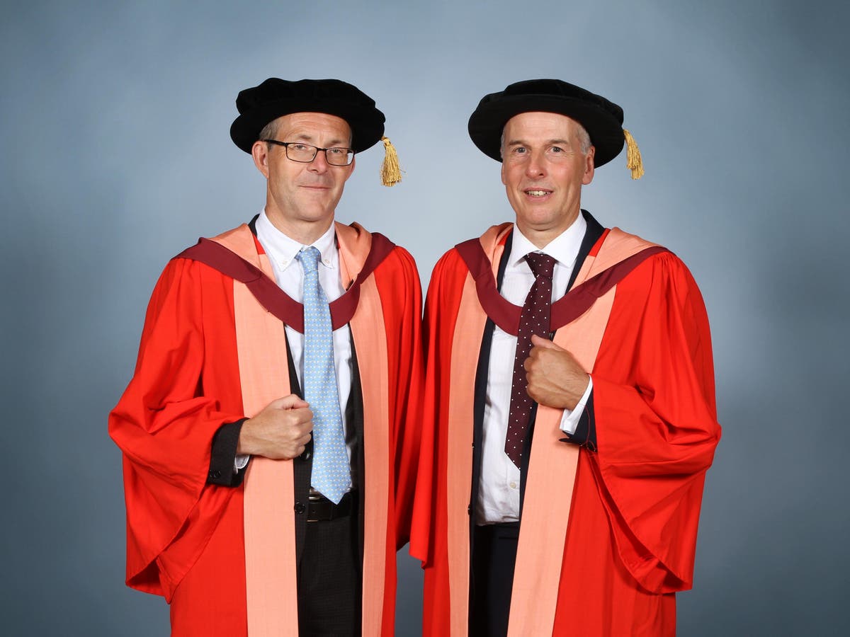 British divers who rescued 12 boys and their football coach from flooded cave in Thailand given honorary degrees