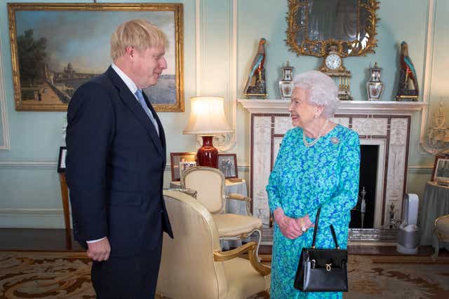 Boris Johnson with the Queen (Victoria Jones/PA)