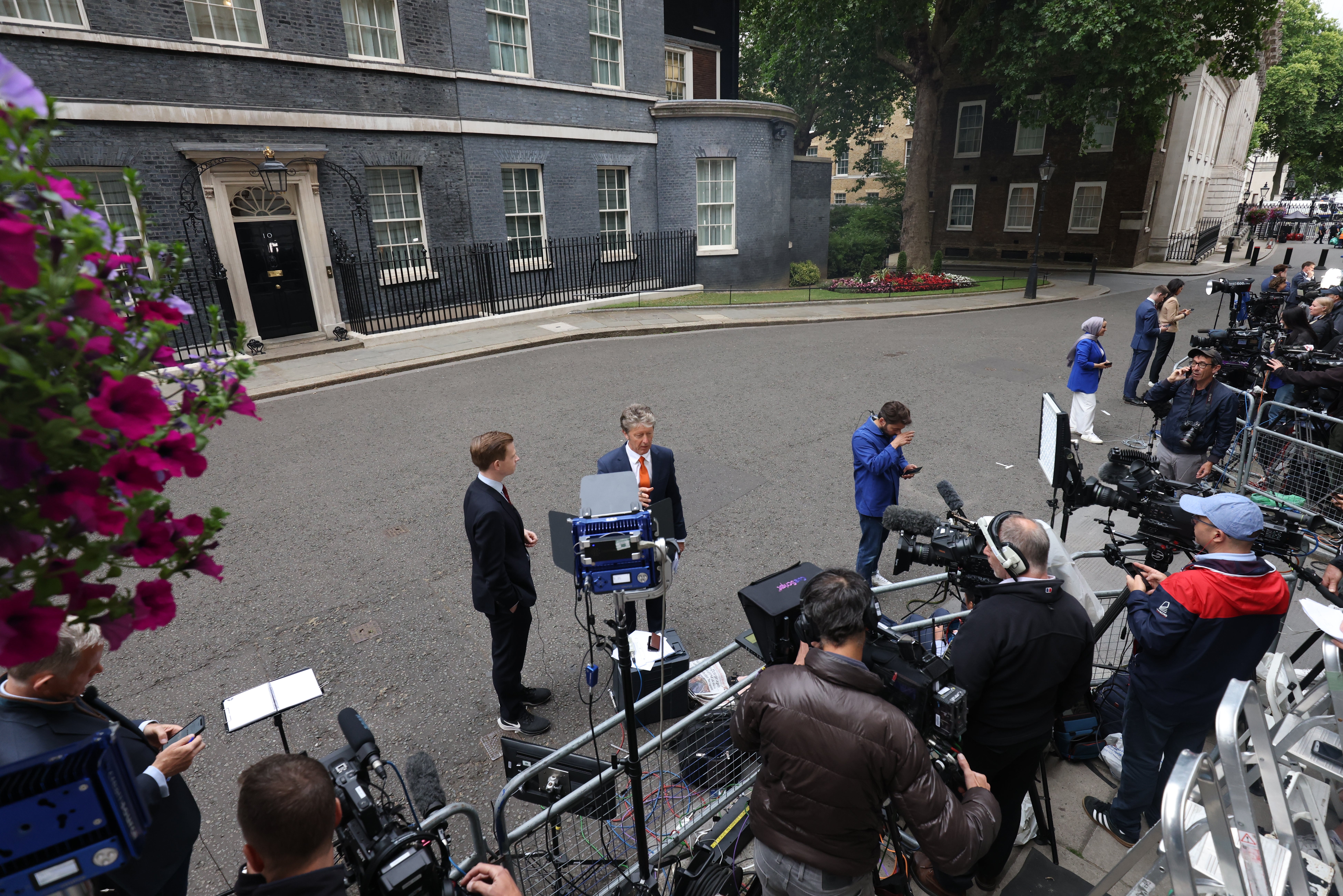 The world’s media remains gathered outside 10 Downing Street to await Boris Johnson’s statement to the nation (James Manning/PA)