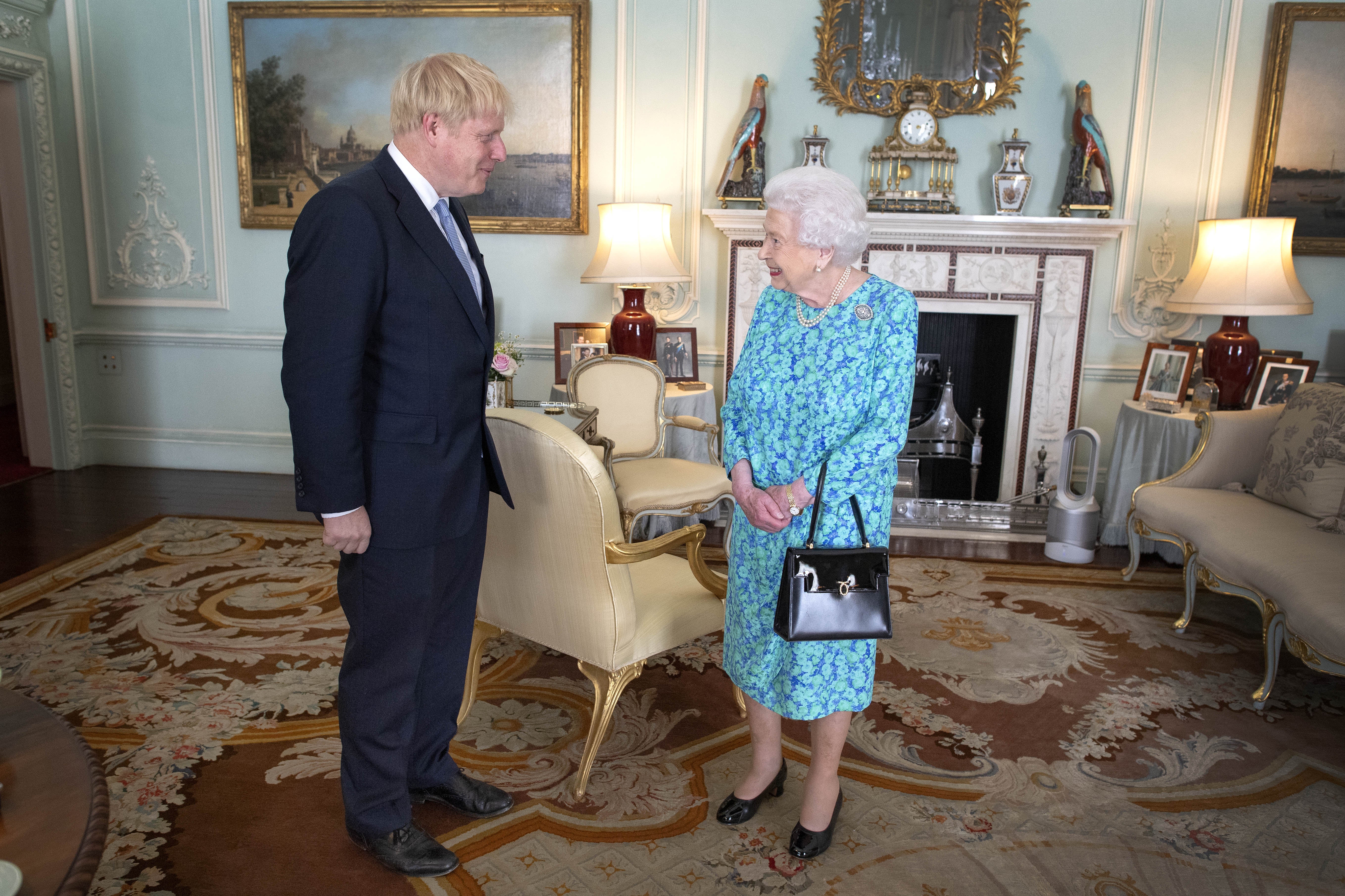 The Queen welcoming newly elected leader of the Conservative party Boris Johnson during an audience in Buckingham Palace, London (Victoria Jones/PA)