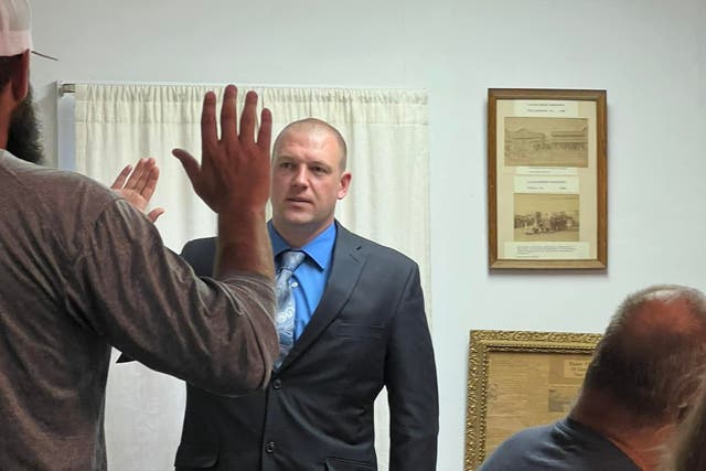 <p>Officer Timothy Loehmann is sworn in by Tioga Mayor David Wilcox</p>