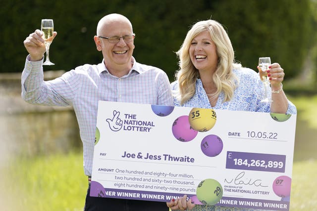 Joe and Jess Thwaite, from Gloucestershire, hold the record for the biggest UK EuroMillions win of £184m (Andrew Matthews/PA)