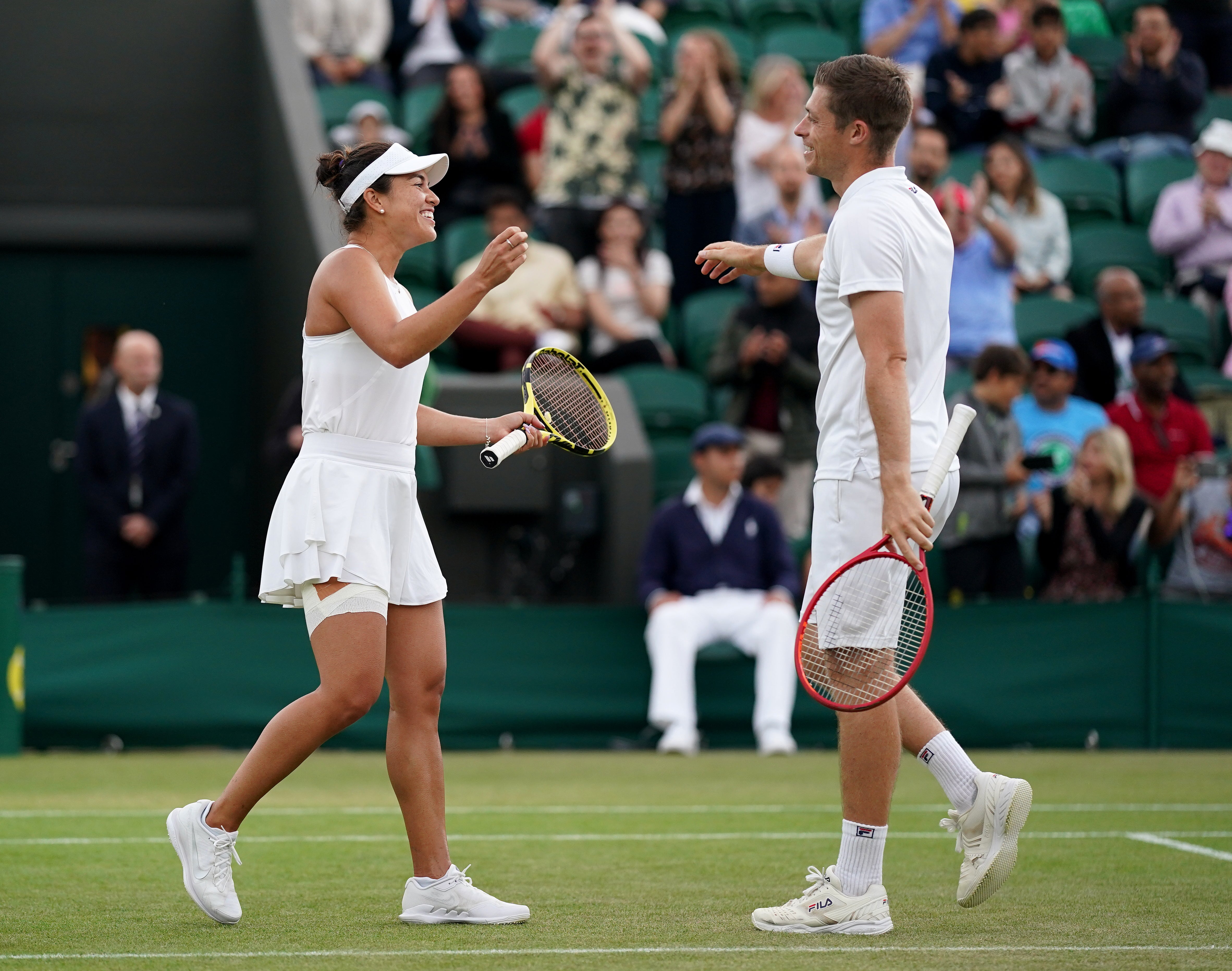 Desirae Krawczyk and Neal Skupski celebrates winning their mixed doubles semi-final match against Sania Mirza and Mate Pavic (PA)