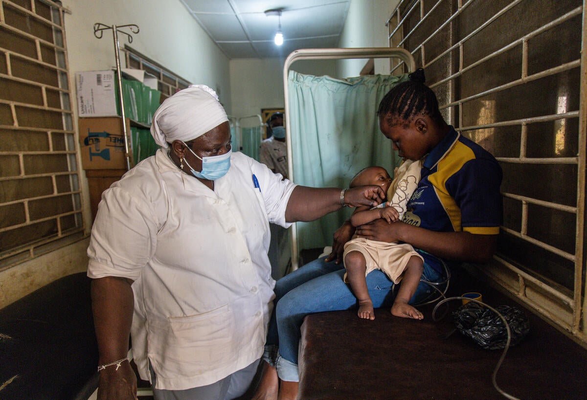 Nine-month-old Malik is given oxygen at a health centre in Ikorodu