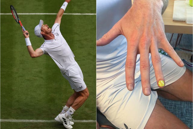 <p>Andy Murray shows off his limited-edition nail designs during Wimbledon</p>