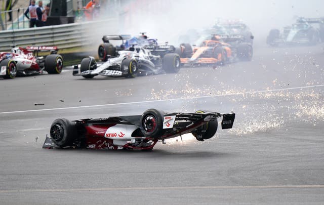 <p>Zhou Guanyu slides towards the barrier at Silverstone (Tim Goode/PA)</p>