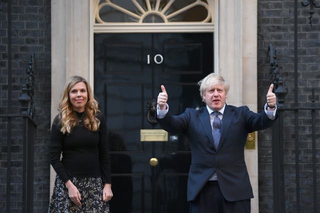 <p>Boris and Carrie Johnson in Downing Street</p>
