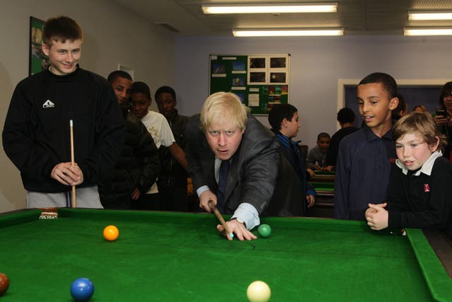<p>Boris Johnson visits a north London youth club in 2013 </p>