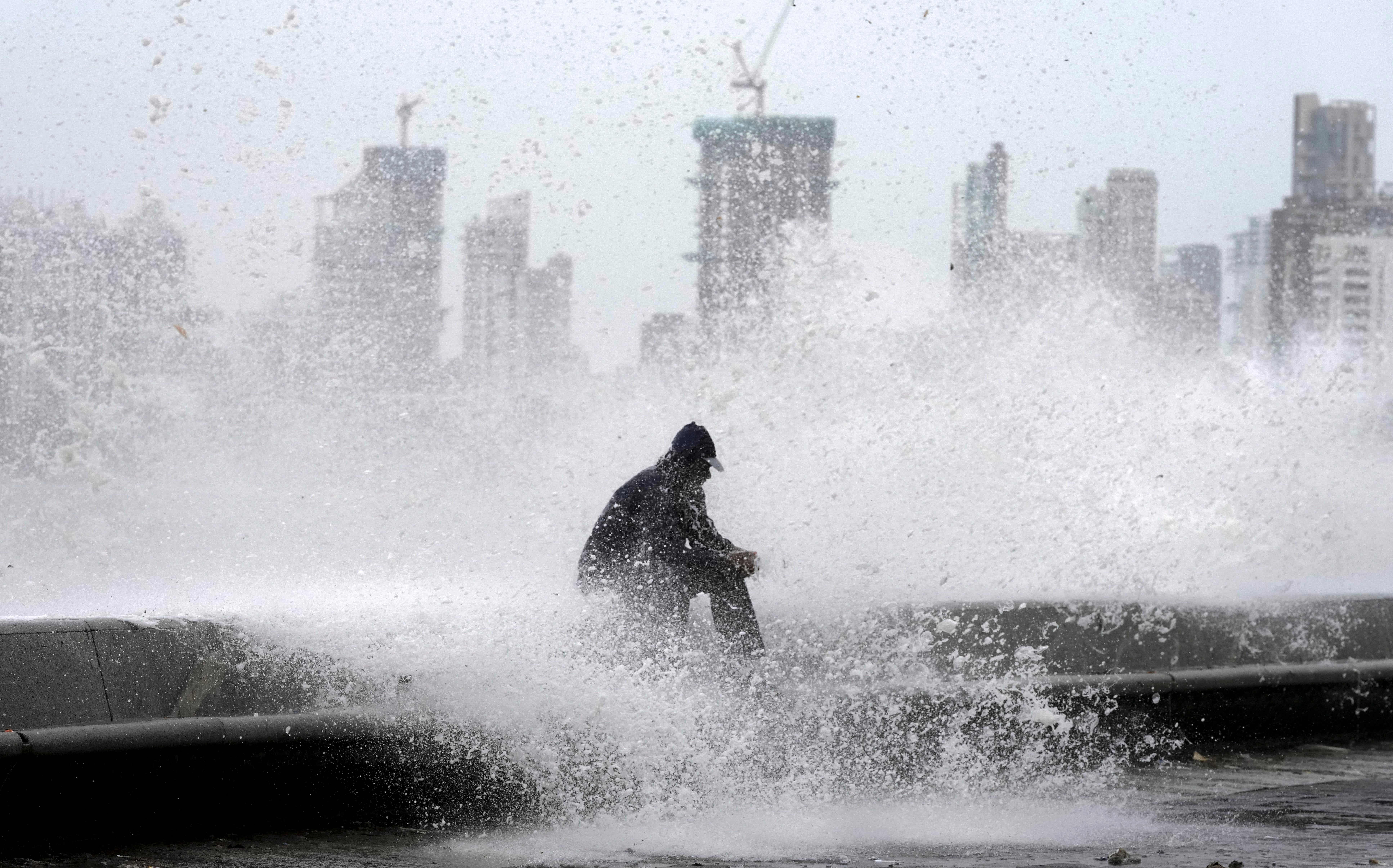 High tide waves on the Arabian Sea coast during monsoon rains in Mumbai